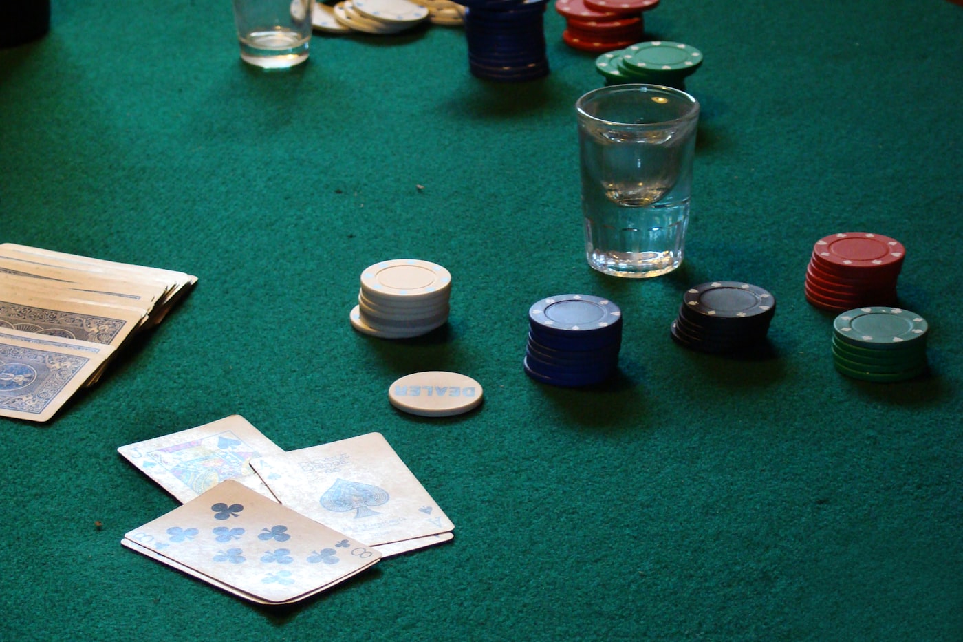 Poker chips and cards on a gaming table